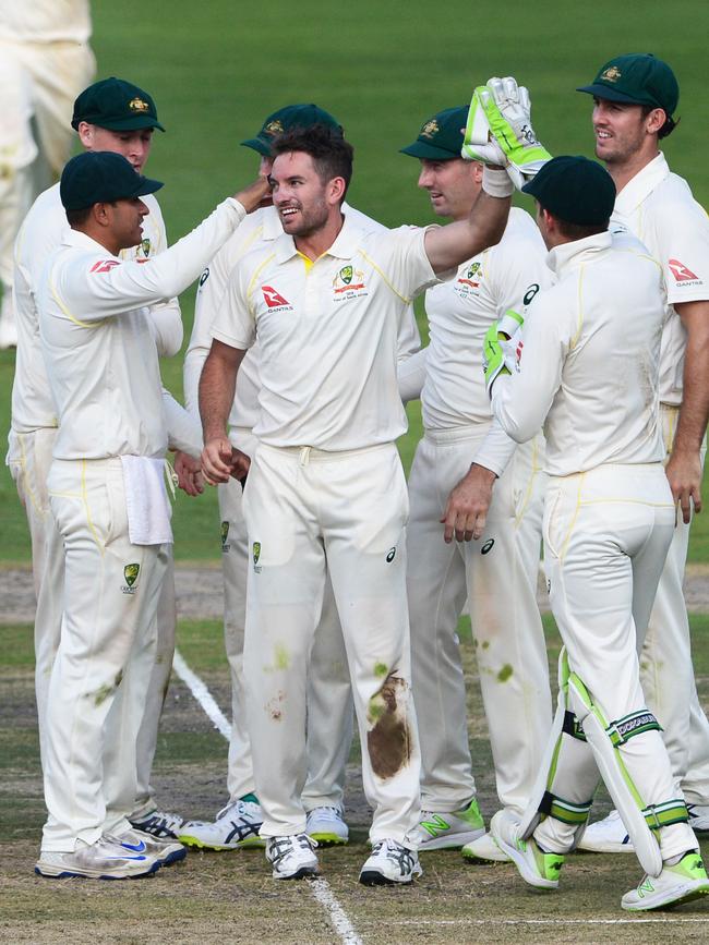 Chadd Sayers celebrates taking his first Test wicket for Australia, that of South African star AB de Villiers, in Johannesburg in 2018. Picture: Lee Warren/Gallo Images/Getty Images