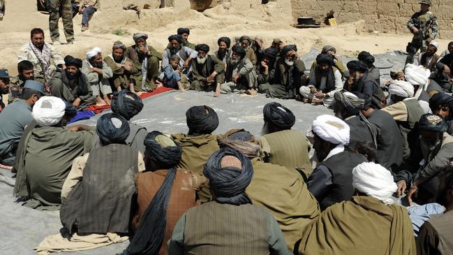 File photograph of Afghan villagers gathering in Uruzgan Province in Afghanistan. Picture: US Navy.