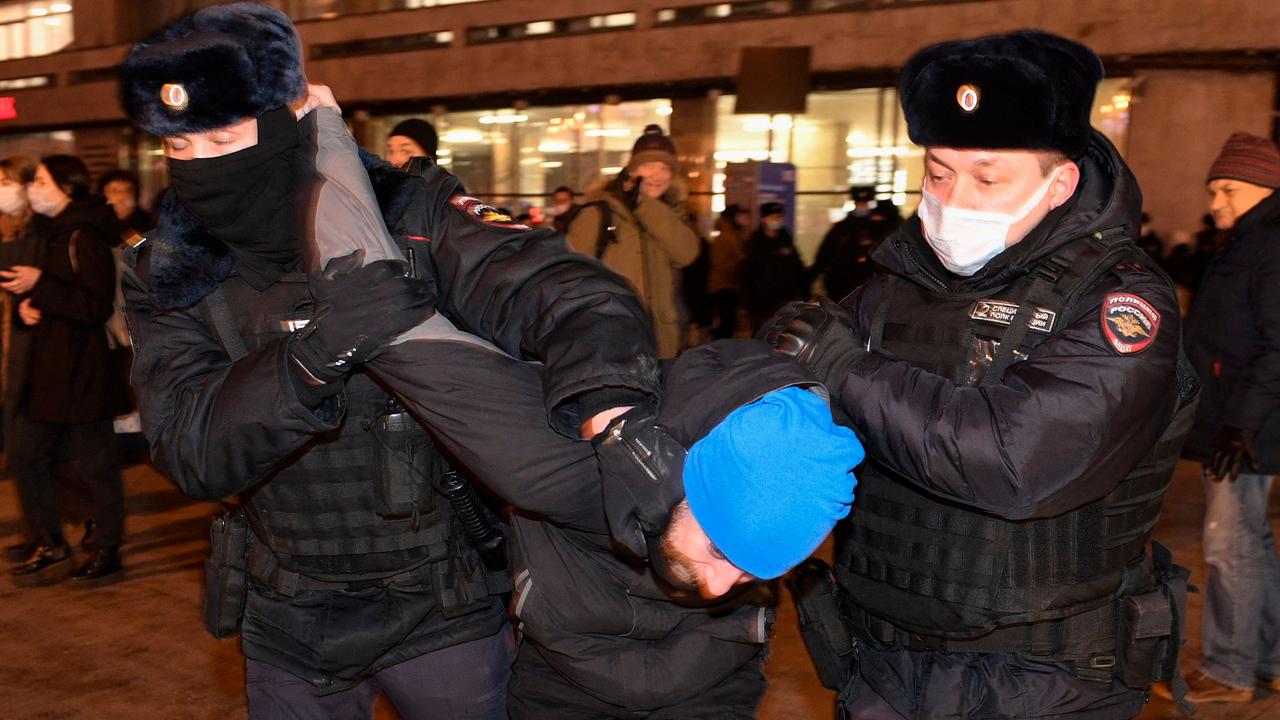 Police detain a man in Moscow. Picture: Alexander NEMENOV / AFP