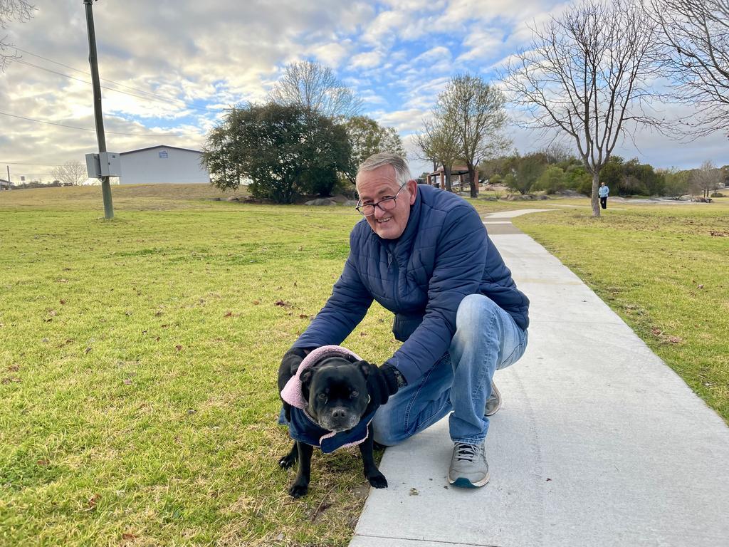 Robert Lockley and his dog River in Stanthorpe doing his best to stay warm on a frosty July morning. July 16, 2024. (Photo: NRM)