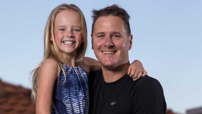 Hot Tomato announcer Luke Bradnam and his daughter Coralie. Photo: Jerad Williams