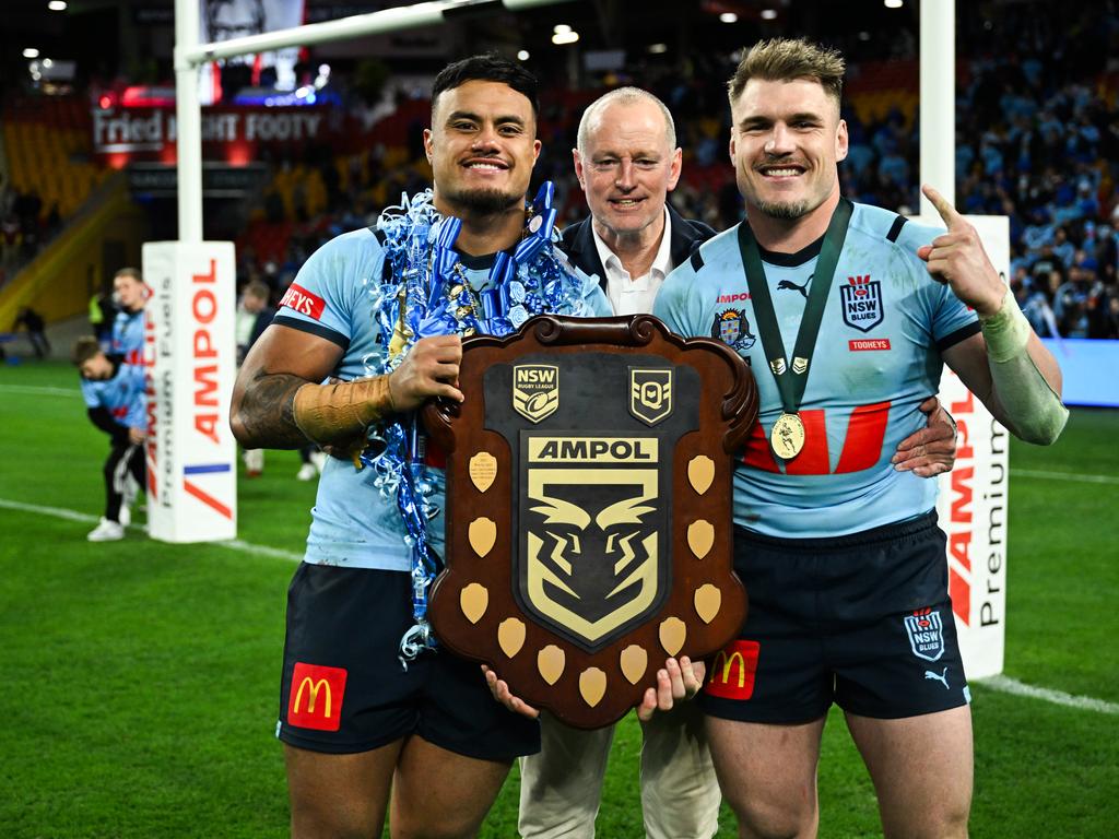 (L-R) Spencer Leniu, Michael Maguire and Angus Crichton celebrate NSW's 2024 win in State of Origin.