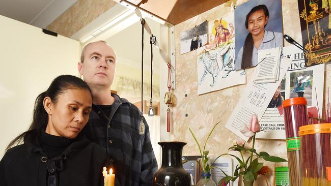 Missing Boronia schoolgirl Siriyakorn "Bung" Siriboon's stepfather Fred Pattison and mother Vanidda with a shrine they have created to their daughter in their Boronia home. Picture: Steve Tanner