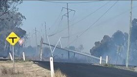 Fire on Dalby-Cecil Plains Rd took down a power pole on the King's Birthday. picture: contributed