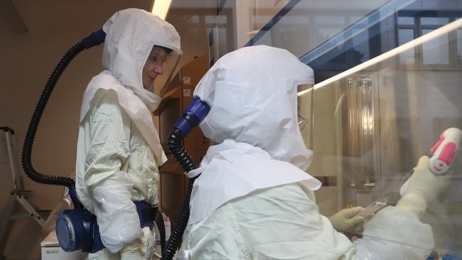 Scientists inside a laboratory in Germany working on a possible coronavirus vaccine