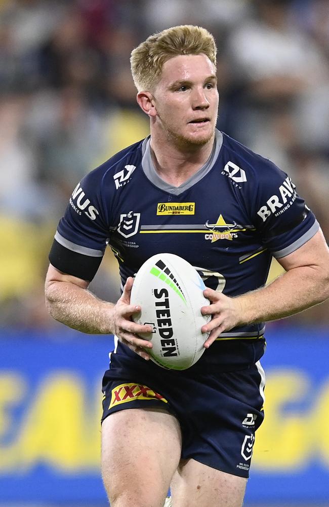 Tom Dearden of the Cowboys runs the ball during the round 23 NRL match between the North Queensland Cowboys and the New Zealand Warriors at Qld Country Bank Stadium, on August 19, 2022, in Townsville, Australia. (Photo by Ian Hitchcock/Getty Images)