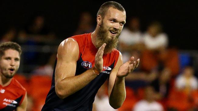 Max Gawn kicks a goal during the Round 7 AFL game between the Gold Coast Suns and Melbourne Demons at Metricon Stadium, Carrara. Pics Adam Head