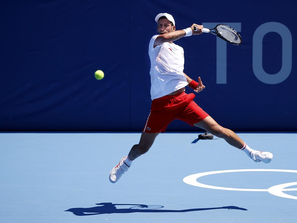 Serbia’s Novak Djokovic warms up before the start of tournament at the Ariake Tennis Centre in Tokyo. Picture: Alex Coppel