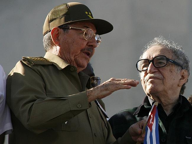 Leftist ideals ... Cuba's acting President Raul Castro, brother of Cuban leader Fidel Castro, chats with Garcia Marquez during a military parade in Havana, Cuba.