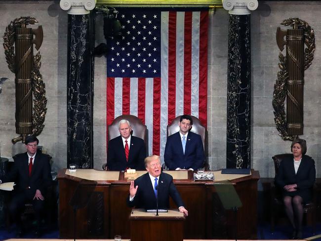 President Donald Trump delivers the State of the Union address as U.S. Vice President Mike Pence (L) and Speaker of the House U.S. Rep. Paul Ryan (R) look on in the chamber of the U.S. House of Representatives. Picture: Chip Somodevilla/Getty Images/AFP