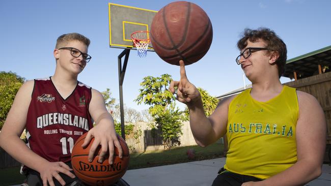 Basketballers Zach Binns and Lachlin Dalton play wheelchair basketball for Queensland and Australia. PHOTO: AAP/Sarah Marshall