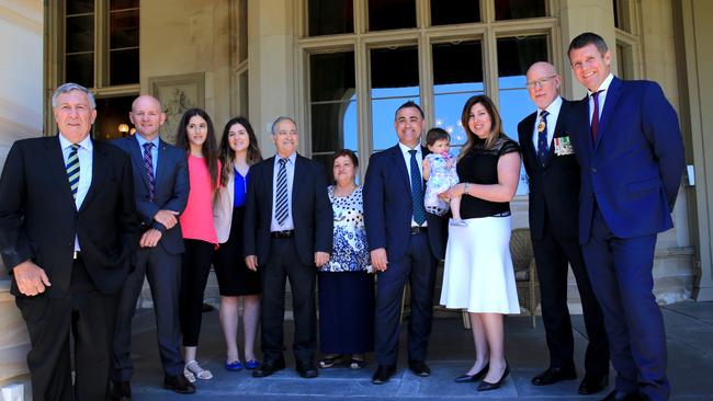 John Barilaro with his family and Mike Baird after being sworn in. Picture: Stephen Cooper