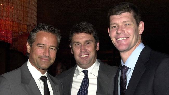 Mark Bouris (L to R), then-Channel 9 CEO David Gyngell and James Packer at a party in 2003.