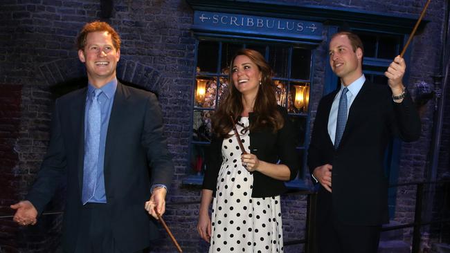 Harry, William and Kate used to share a close bond. Here they share a joke on the set of Harry Potter in 2013. Picture; Getty Images.