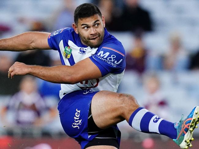 SYDNEY, AUSTRALIA - AUGUST 02: Rhyse Martin of the Bulldogs kicks for goal during the round 21 NRL match between the Canterbury Bulldogs and the Brisbane Broncos at ANZ Stadium on August 2, 2018 in Sydney, Australia.  (Photo by Cameron Spencer/Getty Images)