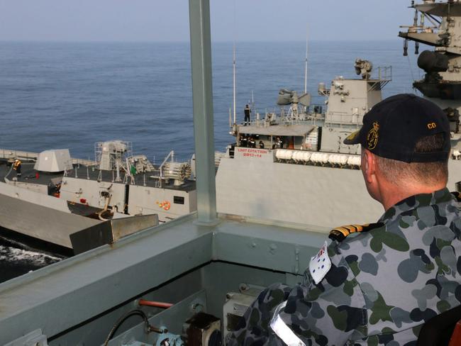 An Indian warship pulls alongside a Royal Australian Naval tanker, HMAS Sirius, during joint military exercises. Source: Defence