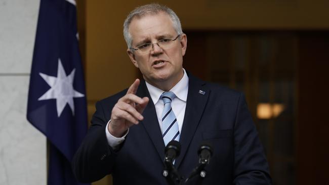 Australian Prime Minister Scott Morrison announces his new line-up yesterday afternoon. Picture: Sean Davey.