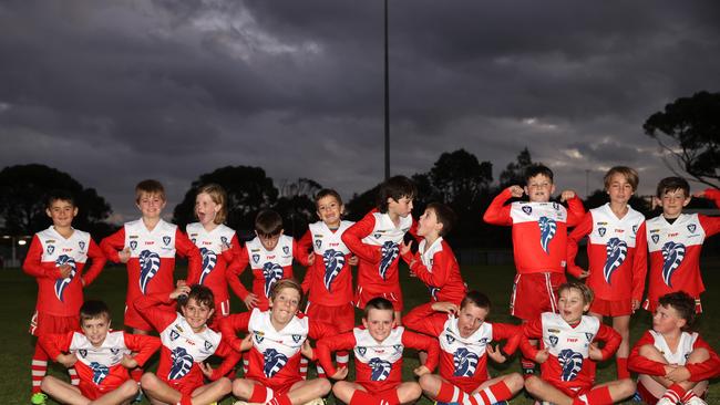Ocean Grove Taylor under-9 football team pull their funniest faces. Picture: Alison Wynd
