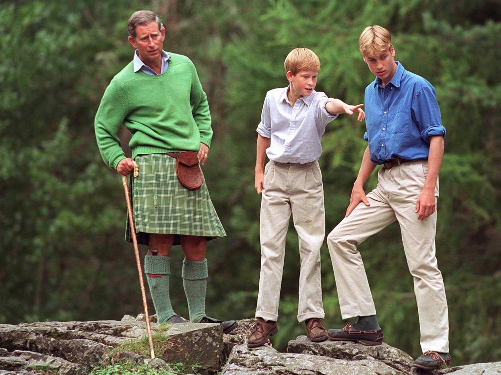 Prince Charles with Prince William and Prince Harry visit Glen Muick on he Balmoral Castle Estate in 1997.