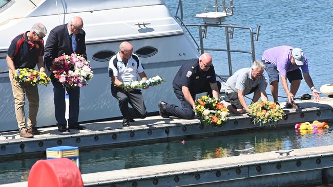 Friends of Nick Smith lay wreaths at Bowline’s docking berth in tribute to the sailor, who died in the Sydney Hobart Yacht Race. Picture: Keryn Stevens