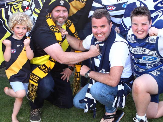 Family of Cats and Tigers fans battling for premiership bragging rights!Tigers family Marcus and Kasia Holt with their children Frankie 4yrs and Ari 9yrs with the Cats family Jono and Jules Holt and their children Mack 12yrs and Milli 14yrs.picture: Glenn Ferguson