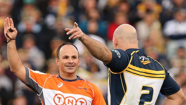 Jaco Peyper and Stephen Moore exchange words. Peyper will be in charge of the Super Rugby final between the Brumbies and Stormers.