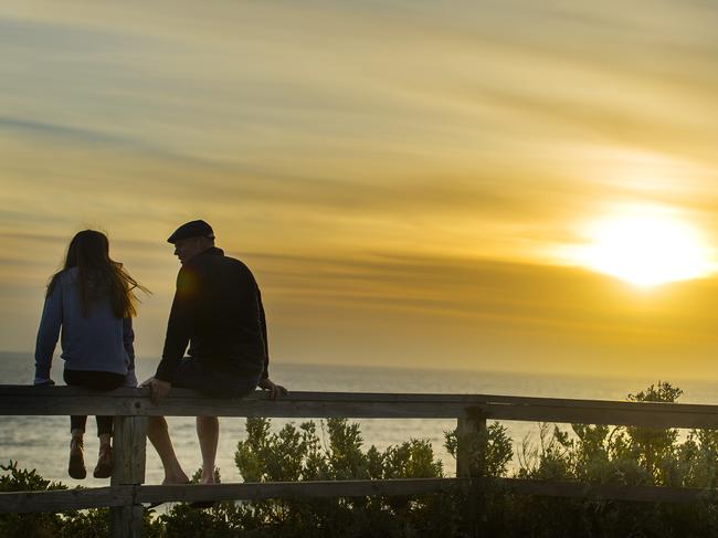 The sun sets on 2014 at the Portsea back beach. Picture: Eugene Hyland