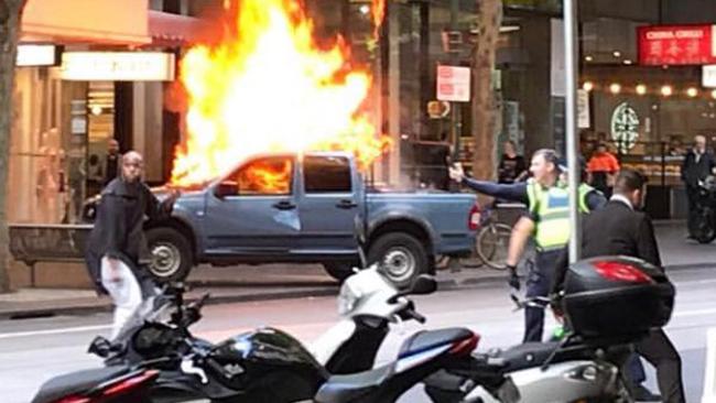 Police confront man. Source: @hyunykim_, Instagram