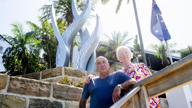 Norbert Wyzenbeek and wife Sharon with the statue they have been ordered to remove by Willoughby Council. Photo: Jeremy Piper