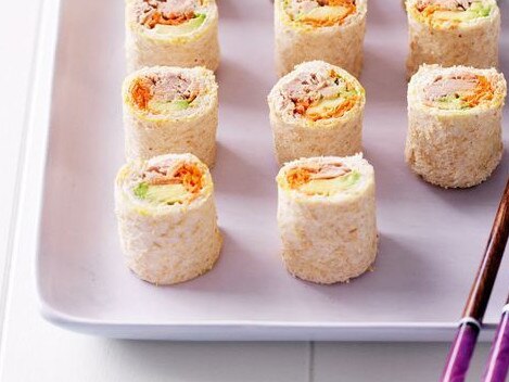 Avocado and tuna sushi sandwiches.