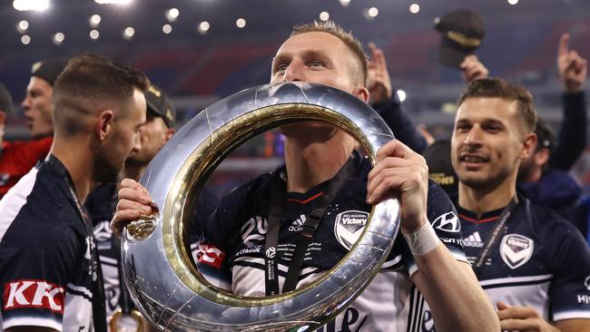 Besart Berisha with the A-League yoilet seat. Picture: Getty