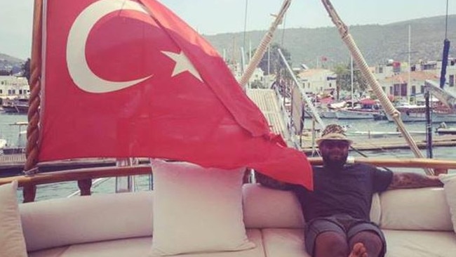 The Daily Telegraph earlier this year revealed the most recent known photos of Ngakuru showing the bikie sitting on a yacht, holding on to a Turkish flag.