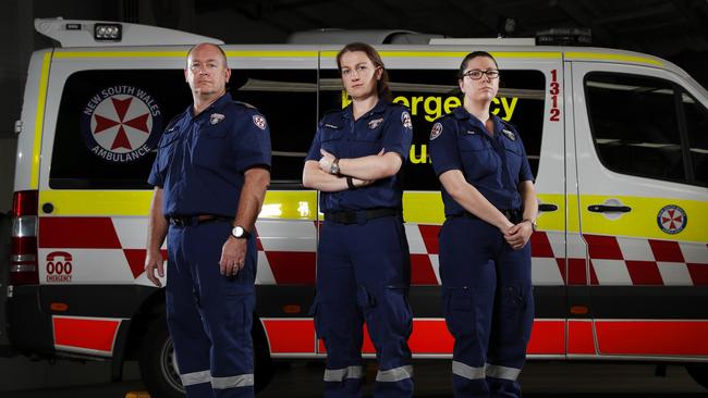 NSW paramedics Craig Hall, Corinne Keefe and Amy Neal (right) at the Northmead Ambulance station. Picture: Jonathan Ng