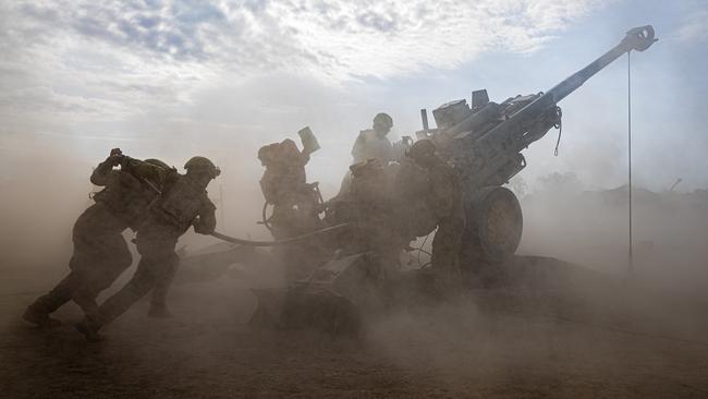 Gunners from the 8th/12th Regiment, Royal Australian Artillery fire 155mm rounds from the M777 howitzer as part of Exercise Predator’s Run 2024, in Mt Bundey, NT. Picture: Department of Defence