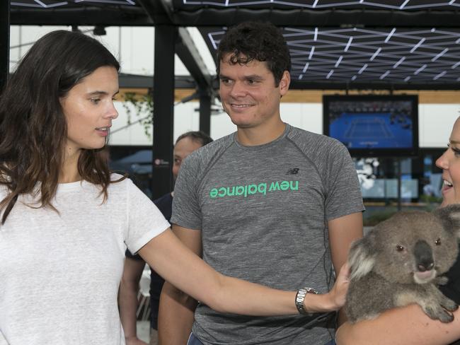 Camille Ringoir, Milos Raonic and a furry koala in Melbourne last week. Picture: Getty Images 