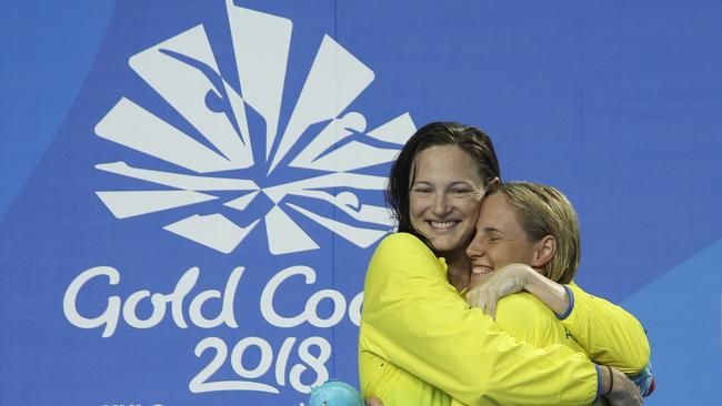 Australia's Bronte Campbell, right, is hugged by silver medalist Cate Campbell after she won gold in the women’s 100m freestyle. Photo: AP