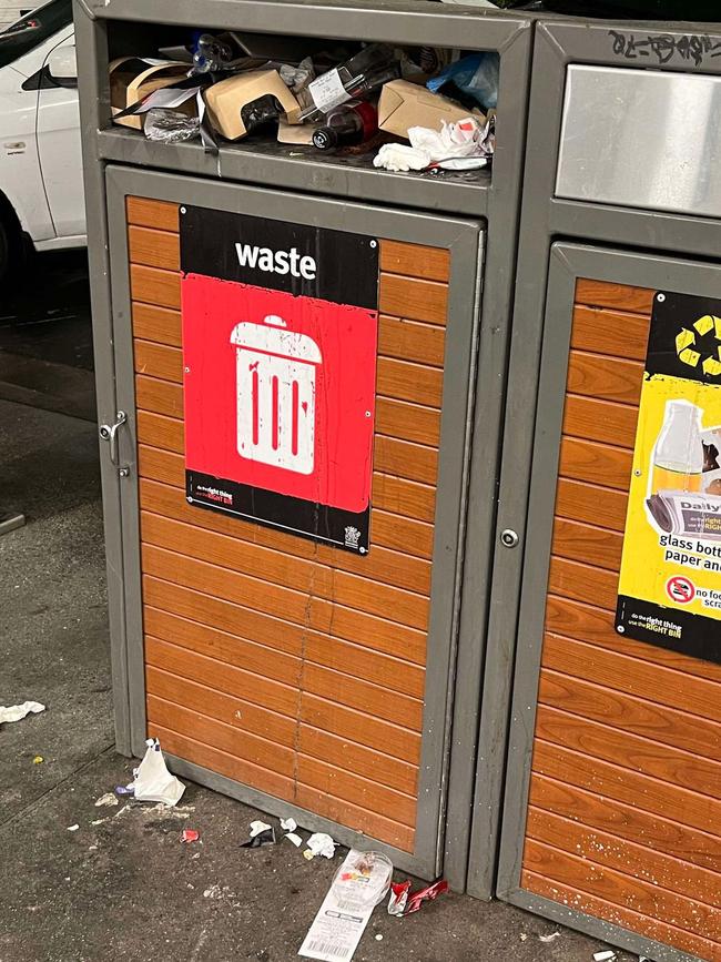 Overflowing public garbage bins photographed in the city centre last year. Picture: Supplied