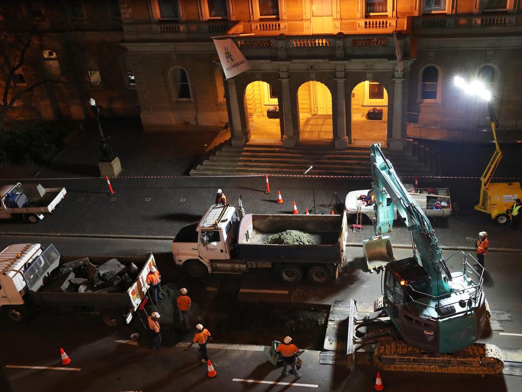 Work in Macquarie Street Hobart on the hole that will house the chamber performance artist Mike Parr will live in for 72 hours during Dark Mofo. Picture: NIKKI DAVIS-JONES