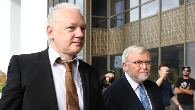 WikiLeaks founder Julian Assange is joined by Kevin Rudd, Australian Ambassador to the US, as he arrived at a United States Courthouse in Saipan, where entered a guilty plea to an espionage charge ahead of his release. Picture: Chung Sung-Jun/Getty Images