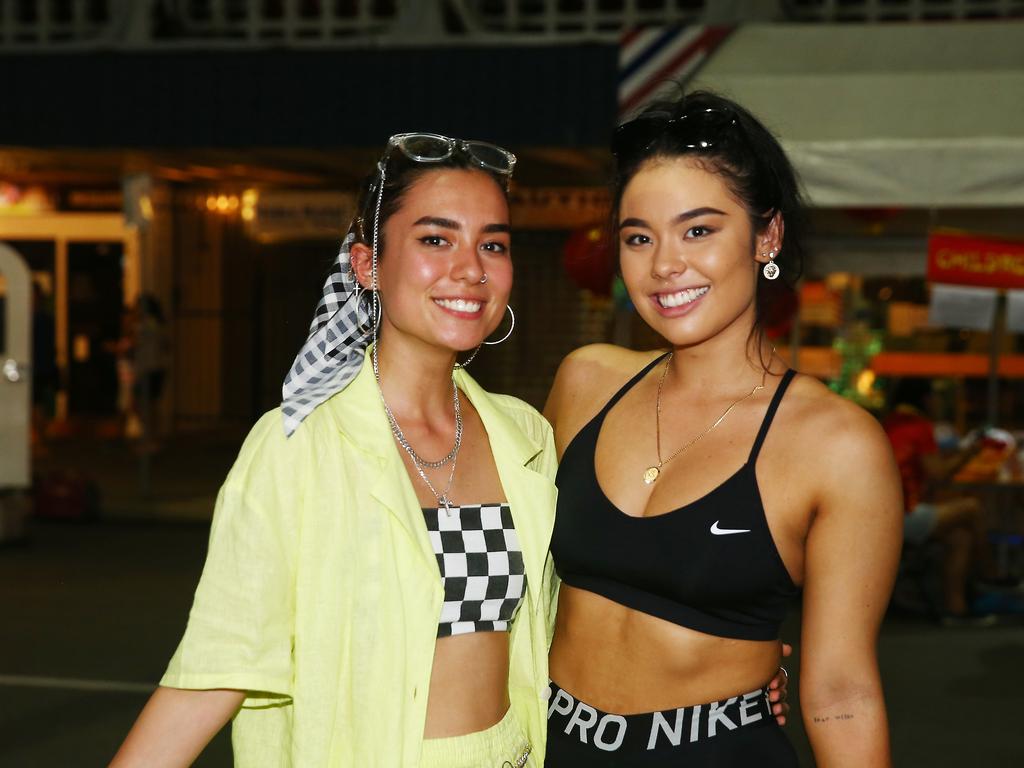 Yuki Doidge and Ami Harris at the Cairns and District Chinese Association Inc Chinese New Year street festival on Grafton Street. PICTURE: BRENDAN RADKE