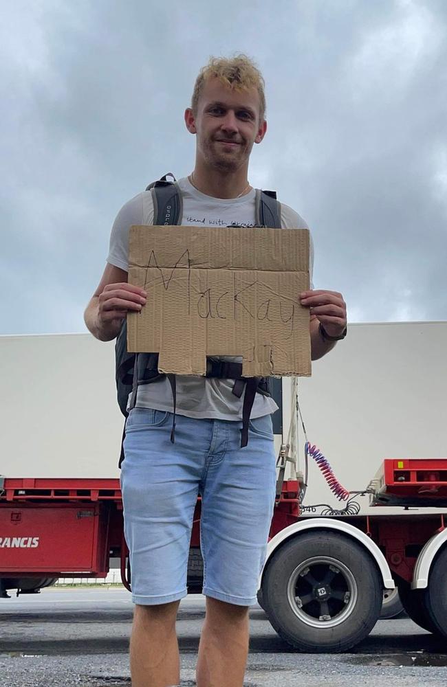 British backpacker Ross Millen is trying everything he can to get to Mackay after his bus heading to Airlie Beach stopped in Rockhampton due to a major rain event in Queensland's north.