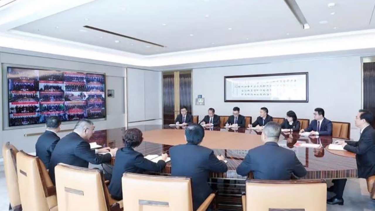 Hui Ka-yan (first right), founder of China Evergrande Group, chairing a conference call with senior executives. Picture: Supplied