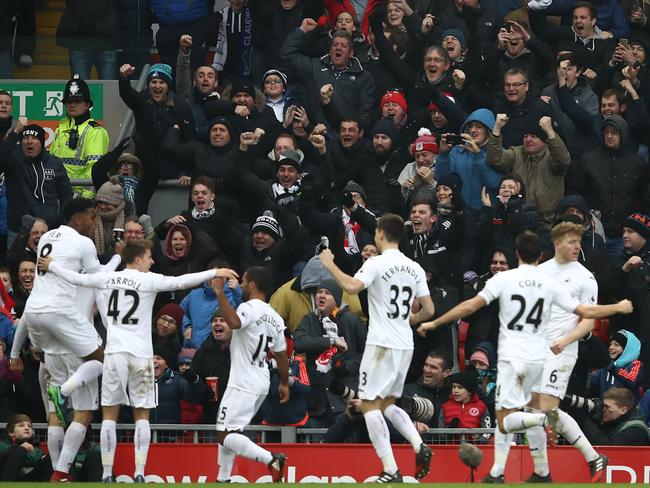 Fernando Llorente of Swansea City (L/obscure) celebrates opening the scoring.