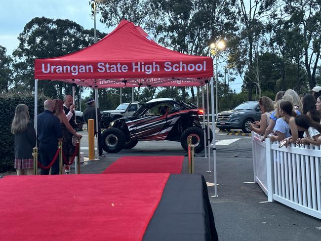 Students from Urangan State High School arrive at their formal.