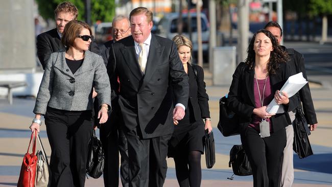 Tasmanian Premier Paul Lennon walks with his team of negotiators to AFL House in Melbourne, Wednesday, April 16, 2008. They were attending a meeting with the AFL to press their case to have an AFL team base in Hobart. (AAP Image/Joe Castro) NO ARCHIVING