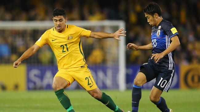 Socceroos’ Massimo Luongo and Japan’s Shinji Kagawa battle during a 2018 FIFA World Cup Qualifier match. Picture: Michael Dodge, Getty Images.