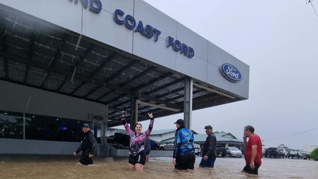 Far North Queensland Motor Group in Tully posted to their Facebook page thanking residents earlier this year for helping during recent floods – “Unfortunately our Tully Dealership is closed today due to flood waters thank you to all of our local peeps who saved our cars … again”. Picture: Facebook.