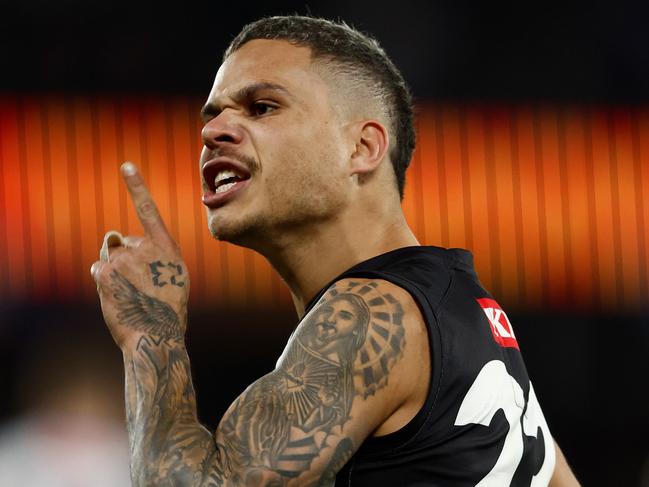 MELBOURNE, AUSTRALIA - JUNE 16: Bobby Hill of the Magpies celebrates a goal during the 2024 AFL Round 14 match between the North Melbourne Kangaroos and the Collingwood Magpies at Marvel Stadium on June 16, 2024 in Melbourne, Australia. (Photo by Michael Willson/AFL Photos via Getty Images)