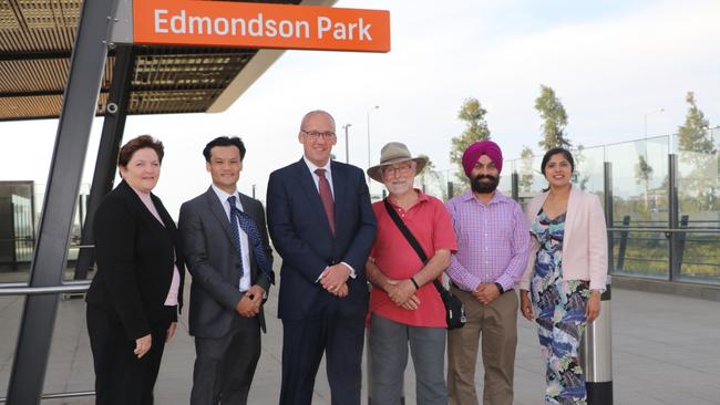 Werriwa MP Anne Stanley, Macquarie Fields MP Anoulack Chanthivong, ALP leader Luke Foley, Liverpool residents Wayne Prior and Surinder Singh, and Labor candidate for Holsworthy Charishma Kaliyanda. Labor announced commitment to $18m multi-storey car park at Edmondson Park train station.