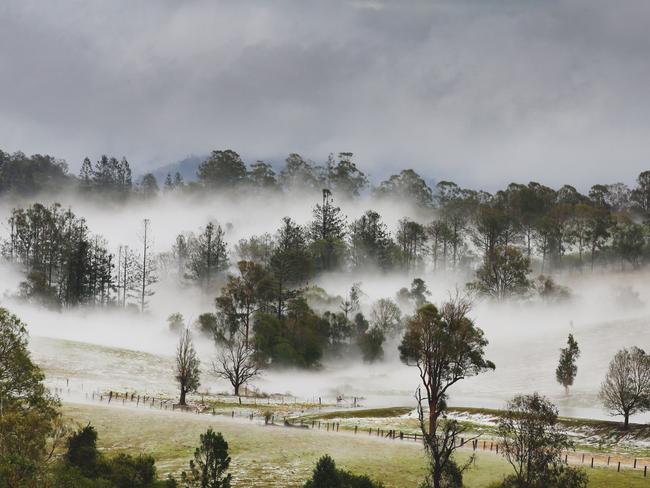 Properties at Long Flat south of Gympie resemble snowfields after a super cell dumped hail, tore down trees and caused devastation across the Burnett and South East. Picture: Lachie Millard